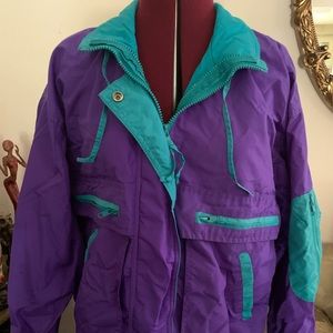 Excellent condition Cabin Creek jacket. Purple and Teal in color. Size S